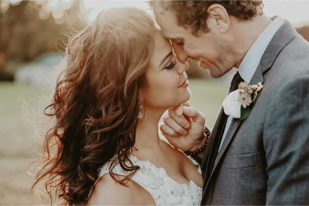 Couple Kissing with A Great Sun Set Couple Kissing Before their Wedding Ceremony